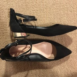 Black flats, ankle straps, gold heels